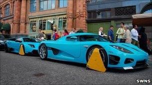 Koenigsegg CCXR and a Lamborghini Murcielago LP670-4 SuperVeloce clamped outside Harrods