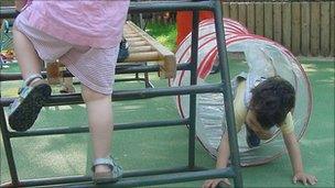 children playing on climbing frame