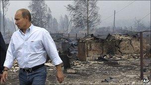 Prime Minister Vladimir Putin tours the village of Verkhnyaya Vereya, Russia, on 30 July, 2010