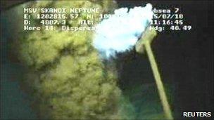 Oil and gas leaking from the ruptured well is sprayed with dispersant. Image captured from BP live video, 15 July