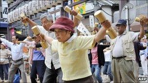 Ageing Tokyo residents use dumbbells on Respect for the Aged Day