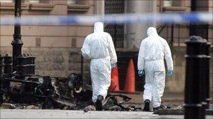 Forensic scientists at bomb scene