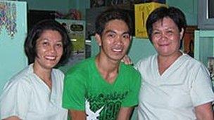 Kiko Dela Tonga and two staff members at the Letre health clinic