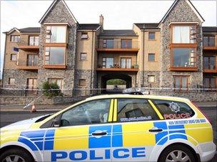 Police car outside flats where boys died