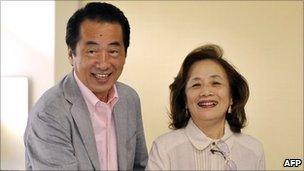 Naoto Kan and his wife, Nobuko, vote in upper house elections in Tokyo on 11 July 2010