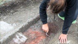 An archaeologist working at the site