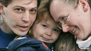 Heath Campbell (left) with his wife, Deborah, and son, Adolf Hitler Campbell