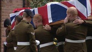 Colleagues carry Staff Sgt Brett Linley's coffin into the church in Bournville