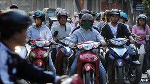 File image of motorcycle riders in Hanoi, Vietnam