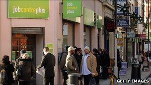 People queue outside branch of Job Centre Plus