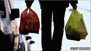 Man carries shopping bags