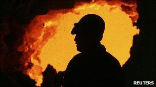 A Chinese labourer at a workshop in an iron and steel factory