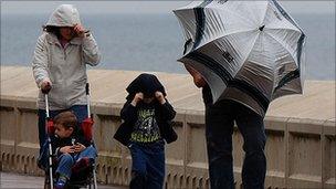 Family in Scarborough in bad weather