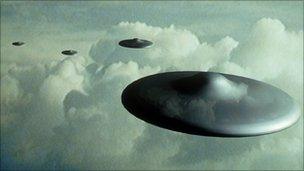 Computer illustration of flying saucers