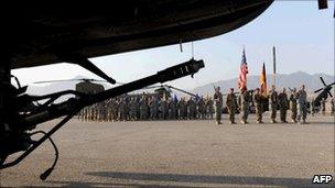 German and US soldiers take part in a ceremony at the German field camp in Mazar-i-Sharif on 16 July 2010