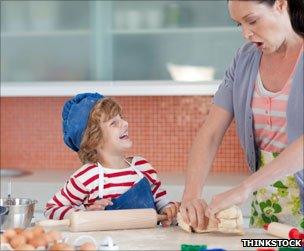 Mother and son baking