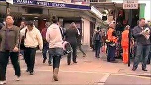 Passengers outside Warren Street station