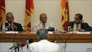 Former Sri Lankan diplomat Bernard Gunathilaka, back to camera, testifies on the first day of public hearings in the commission looking into Sri Lanka's civil war in Colombo, Sri Lanka, 11 August 2010