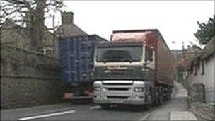 A lorry drives through Chideock