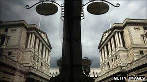 Bank of England reflected in a shop window