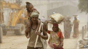 Labourers at the Indira Gandhi stadium in Delhi on Wednesday 18 August 2010