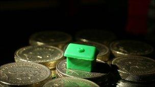 Monopoly house on cash