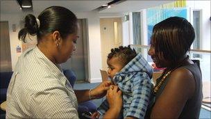 Michaeli, her son Zephaniah and their nurse Caroline