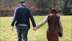 Older couple walking