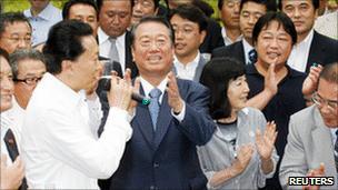 Former PM Yukio Hatoyama, left and Ichiro Ozawa, right 19 August 2010