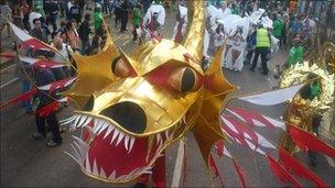 Golden dragon costume on Ladbroke Grove