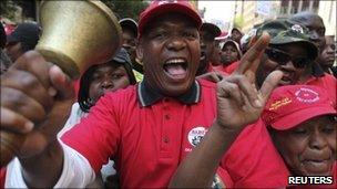 South African state workers seeking higher wages take part in a protest march in Johannesburg on 26 August 2010
