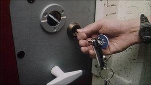 prison warden locks door