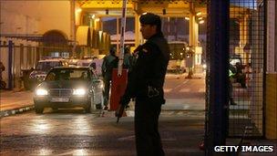 A Spanish policeman mans the Tarajal border checkpoint, in Ceuta, file pic November 2007