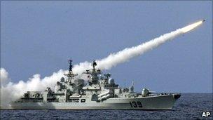 A Chinese ship launches a missile during a military exercise in the South China Sea on 29 July 2010