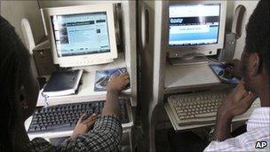 Nigerians browse the internet at a cybercafe in Lagos