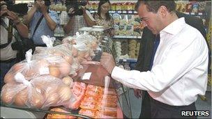 Russia's President Dmitry Medvedev visits a food store in the city of Orenburg