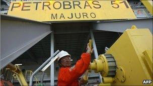 A worker aboard the Petrobras P-51 off-shore oil platform