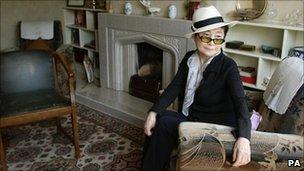 Yoko Ono, inside John Lennon's childhood home