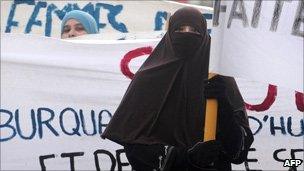 Burka-wearing demonstrator