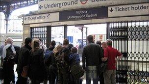 Passengers at Victoria Tube station