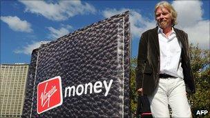 Richard Branson with Virgin Money logo