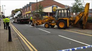 JCB digger at scene of crime