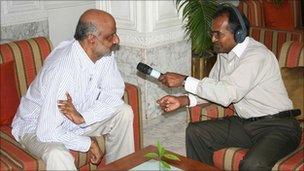 being interviewed by Saroj Pathirana