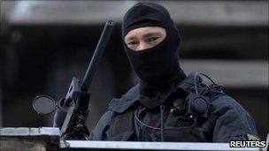 A police sniper near Sanssouci palace in Potsdam, 8 September 2010