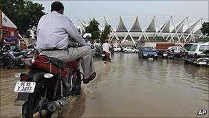 Flooding outside the Jawaharlal Nehru stadium, one of the main Commonwealth Games venues