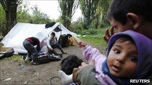 Roma family living in tent in France