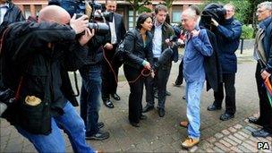 Ray Gosling surrounded by media outside Nottingham Magistrates' Court