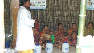 Village women being given a lesson in nutrition