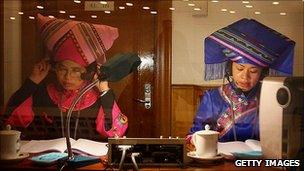 Minority language translators at work at the National People's Congress