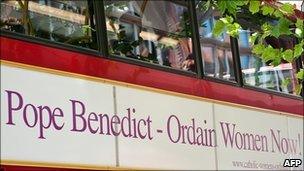 A London bus displays an advert calling for Pope Benedict to ordain women, 31 August 2010